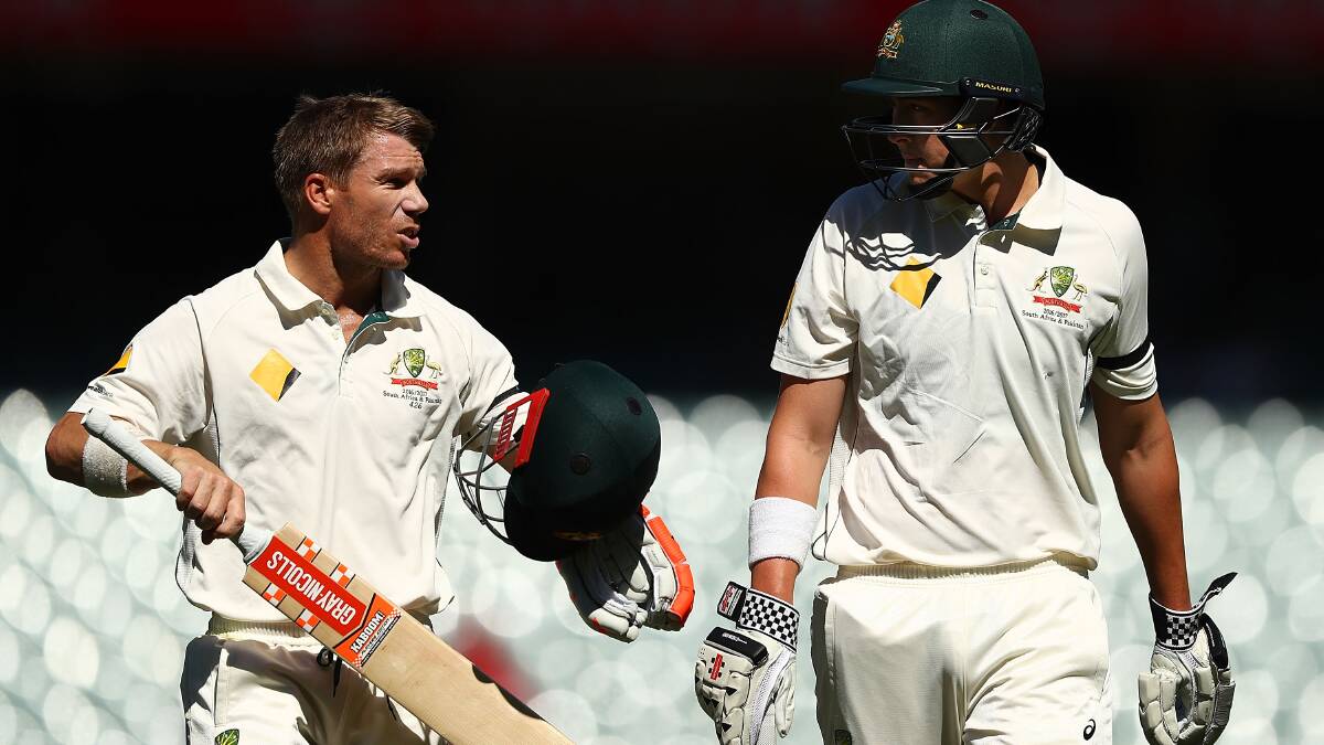 Dave Warner and Matt Renshaw on day four of the third Test against South Africa. Picture: Getty Images