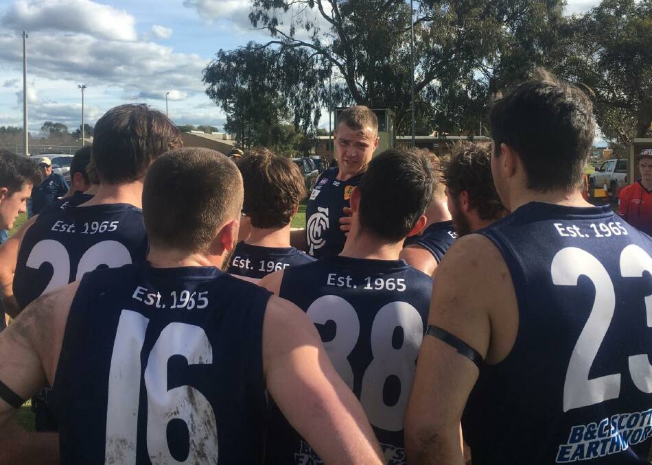 TALKING TOUGH: Coleambally coach Josh Hamilton lays down the law to his troops after The Rock-Yerong Creek's flying start. 