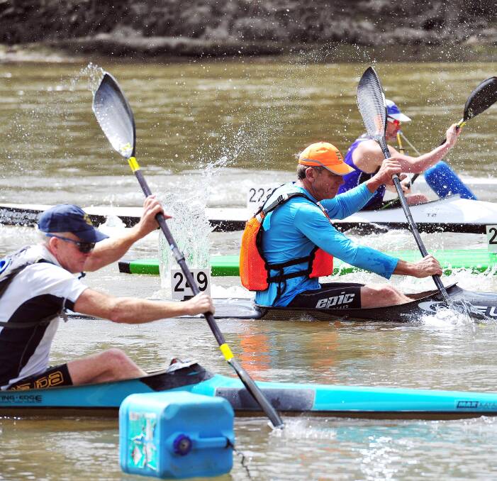 CHANGE OF SCENERY: Competitors on the Murrumbidgee in last year's Paddle NSW Marathon Race. Flood concerns at the river have seen this year's event shifted to Lake Albert. Picture: Kieren L Tilley