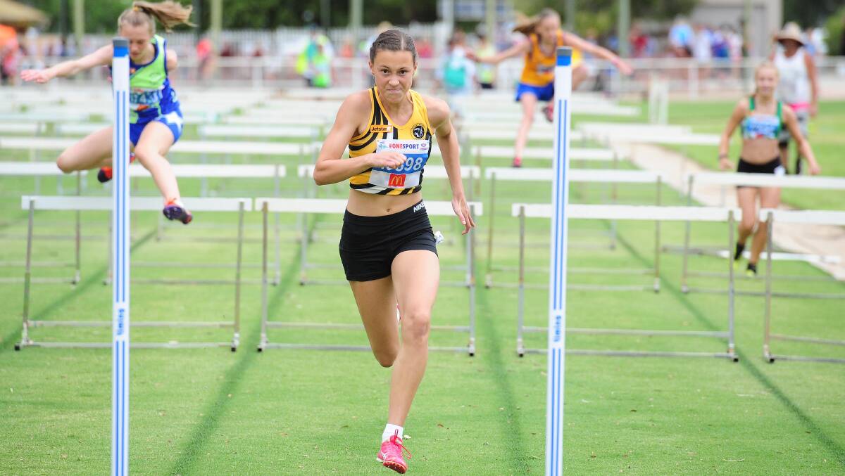 ON TRACK: Wagga athlete Georgia Hallam lighting up the Jubilee track at the regional championships early this year. Picture: Les Smith
