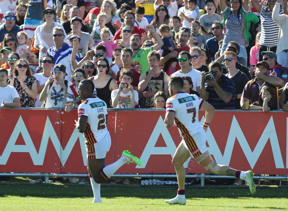 Country fans cheer Akuila Uate getting clear, with Jack Bird in support, at Wagga last year. Picture: Les Smith