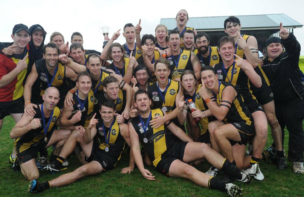 TIGERS TRIUMPH: Wagga Tigers celebrate their six-goal victory over Ganmain-Grong Grong-Matong in the reserve grade grand final at Robertson Oval. 