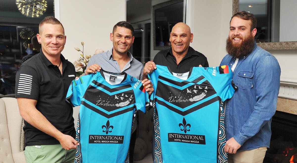 GROUP OF STARS: Tony Mundine (second from right) helps launch the new Dindima team with, from left, Peter Little, Jay Little and Clifford Morris. Picture: Kieren L Tilly