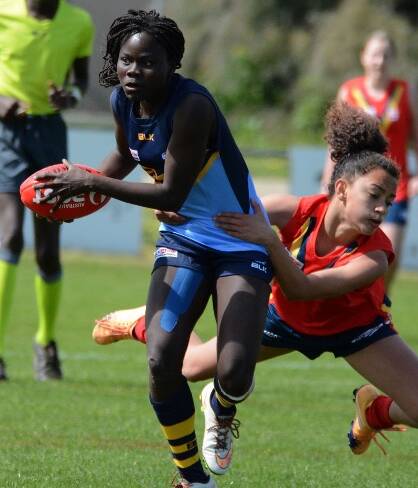 Biola Dawa playing for NSW/ACT All Nations at the Female Diversity Championships.