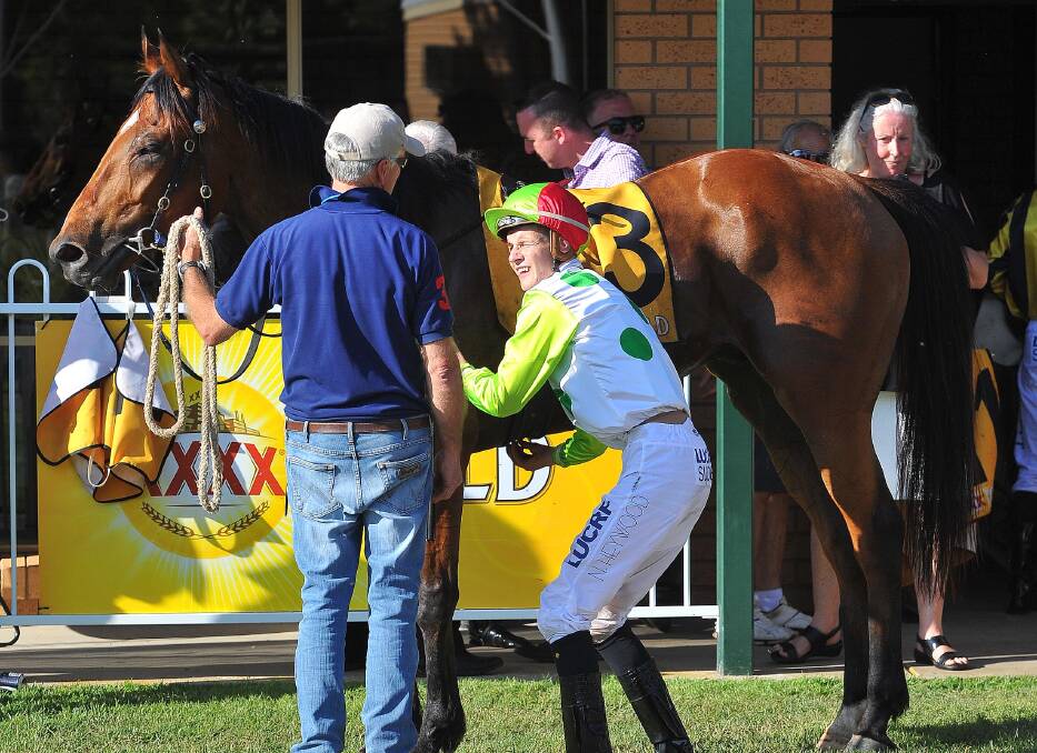 SNAKE GULLY CUP SUCCESS: Zero To Ten with trainer Jim Scobie and jockey Nick Heywood after winning last year's feature at Gundagai. Picture: Kieren L Tilly