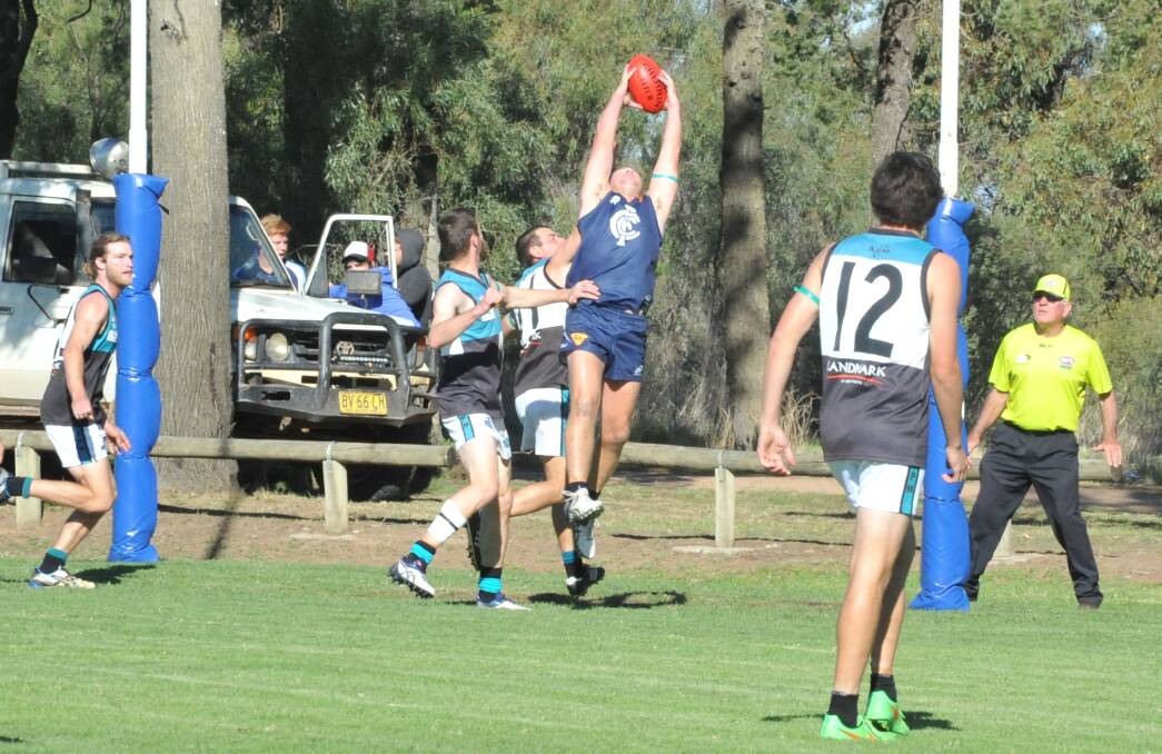 FORWARD PRESENCE: Brandon Mathews marks in the goal square for Coleambally in the Blues' win over the Northern Jets on Saturday. Picture: Riley Krause