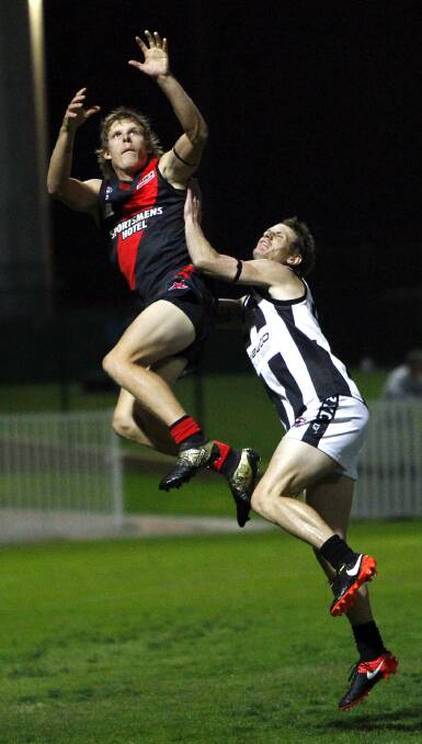 Block gets airborne against The Rock-Yerong Creek in the Anzac Challenge match at Robertson Oval. 