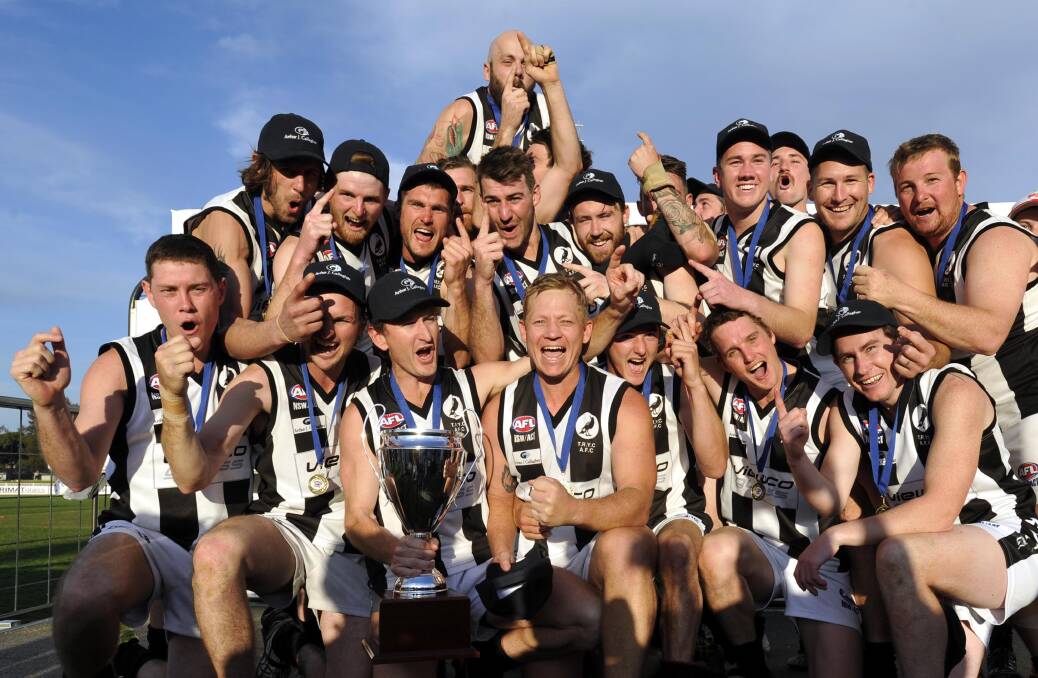 CELEBRATION: The Rock-Yerong Creek in party mode after pulling off a thrilling grand final victory over East Wagga-Kooringal at Robertson Oval on Saturday. Pictures: Les Smith