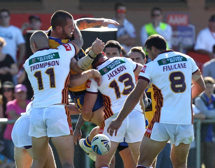 UPENDED: City's Nathan Peats meets a wall of opposition from Country in Wagga in 2015. Picture: Les Smith