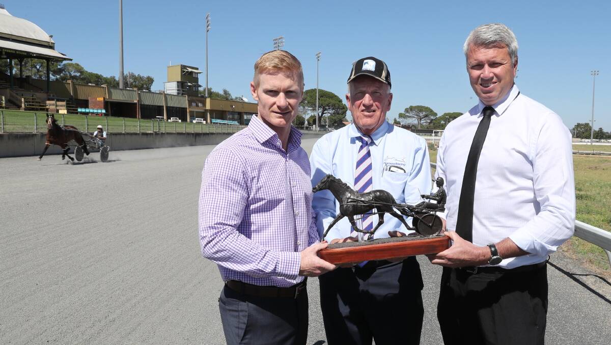ON TRACK: Mark Calverley (Southern Sports Academy) with Barry McColl (Harness Racing NSW) and Graeme White (Wagga Harness Racing).