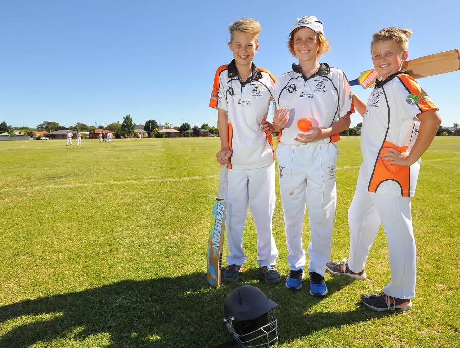 NEW HORIZONS: RSL Bulldogs players (from left) Fin Hubbard, 10, Charlie Munn, 13, and Connor McPherson, 11, are excited about day-night Test cricket. Picture: Kieren L Tilly