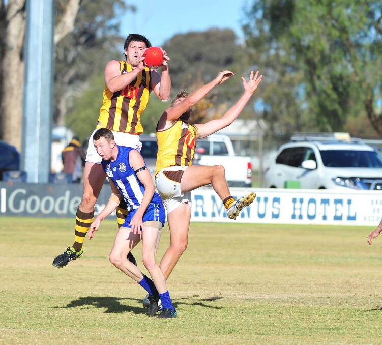 BIG GAME: East Wagga-Kooringal ruckman Nick Hull rises above Temora's Chase Grintell at Nixon Park on Saturday. Picture: Kieren L Tilly