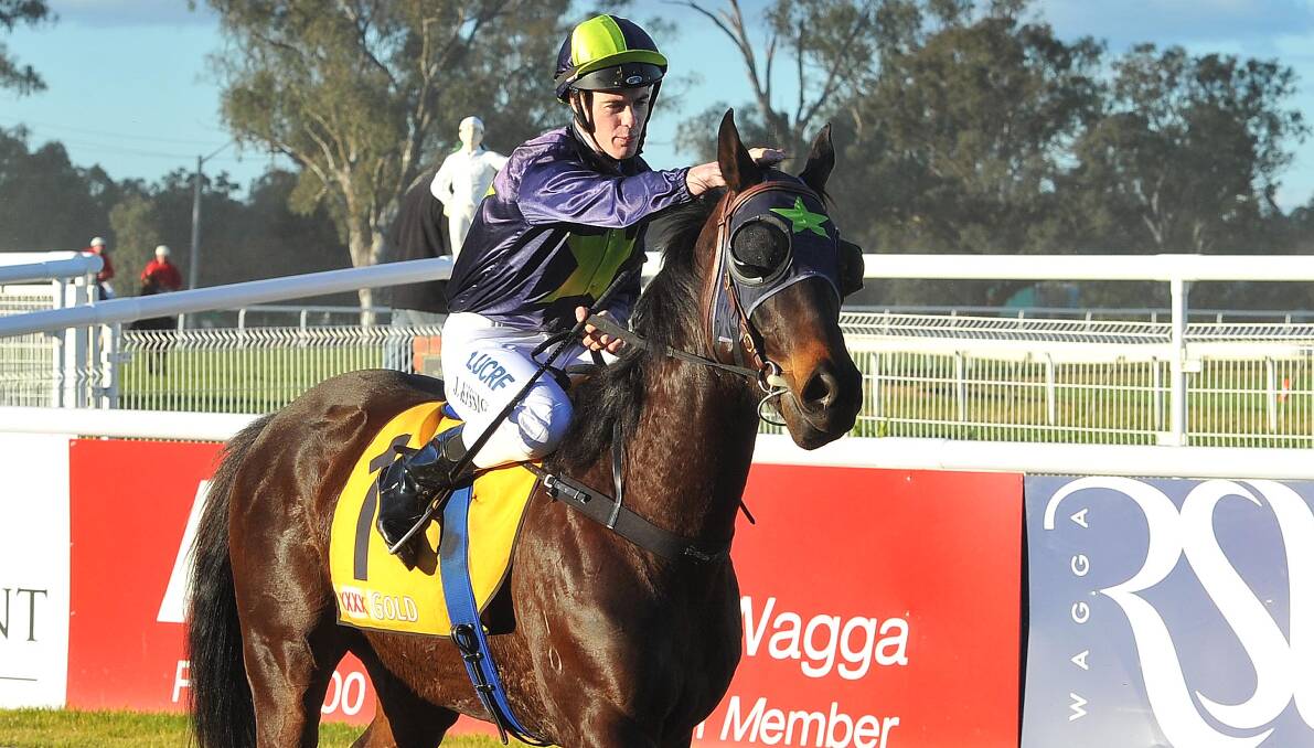 OUT OF THE SADDLE: Jockey John Kissick returns after winning on Cherokee Warrior at the Murrumbidgee Turf Club in August. Picture: Kieren L Tilly