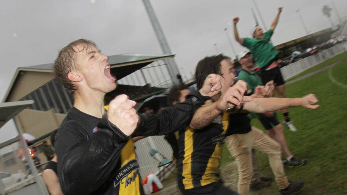 Tigers' Brady Morton leads the celebrations on full-time in the Riverina League grand final. Picture: Les Smith
