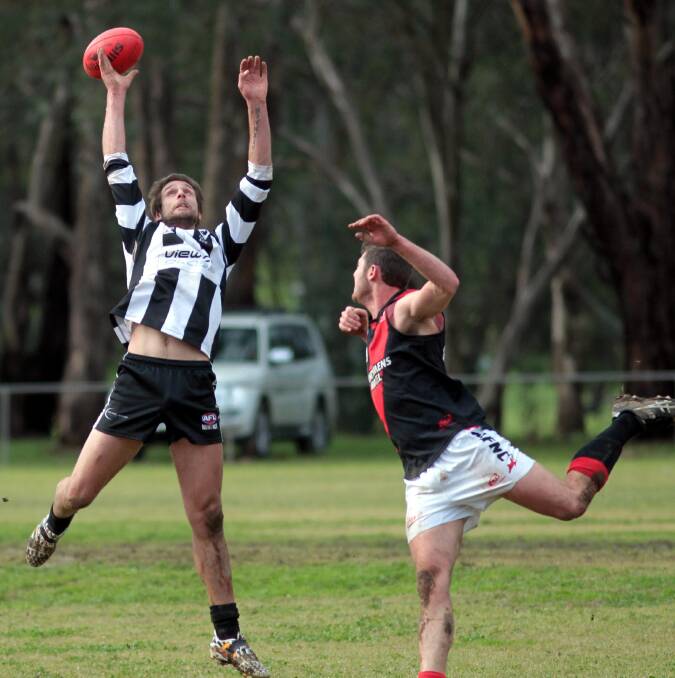 BIG CHALLENGE: TRYC's Josh Meiselbach, left, was among the Pies' best last week as they raced to a 103-point victory over Marrar. Picture: Les Smith
