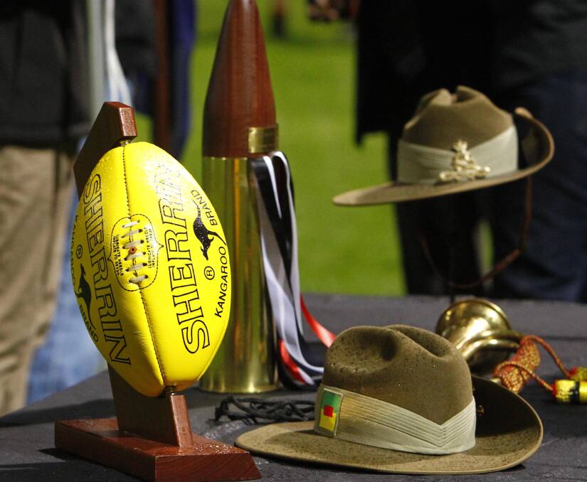 The unique Anzac Challenge trophy (at the rear) is always on display when Marrar and The Rock-Yerong Creek hold their tribute match. Pictures: Les Smith