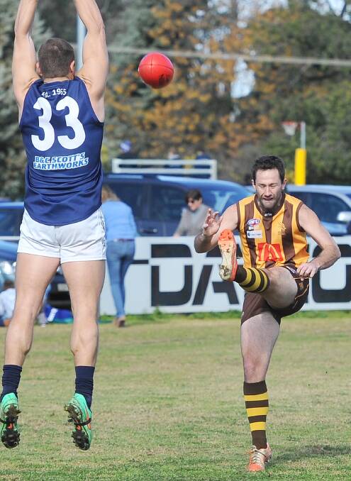LEGS ELEVEN: Marc Geppert kicks his second goal at Gumly on Saturday.