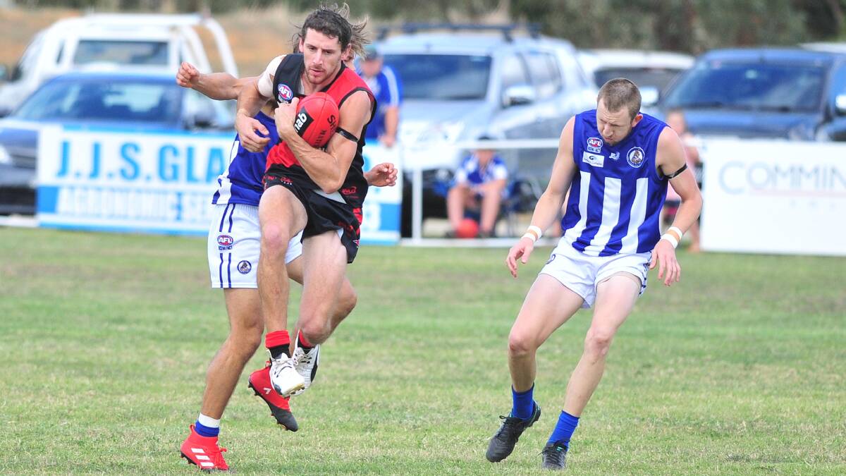 Bombers prove too good for the Roos in season-opener at Langtry Oval. Pictures: Kieren L Tilly