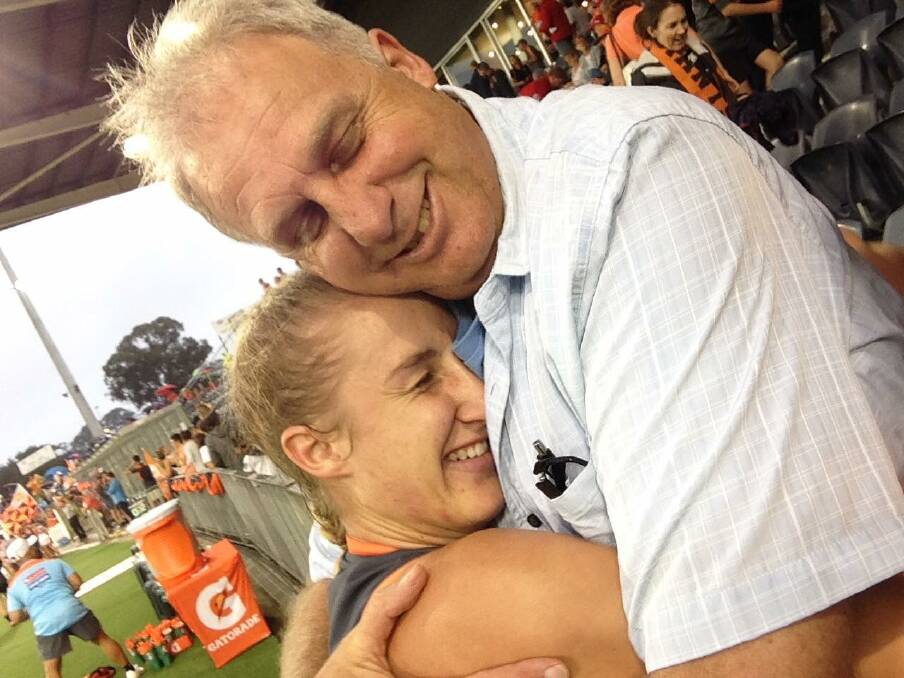 PROUD MOMENT: Ganmain's Clare Lawton and father Jed celebrate her realisation of a dream after playing for the GWS Giants.