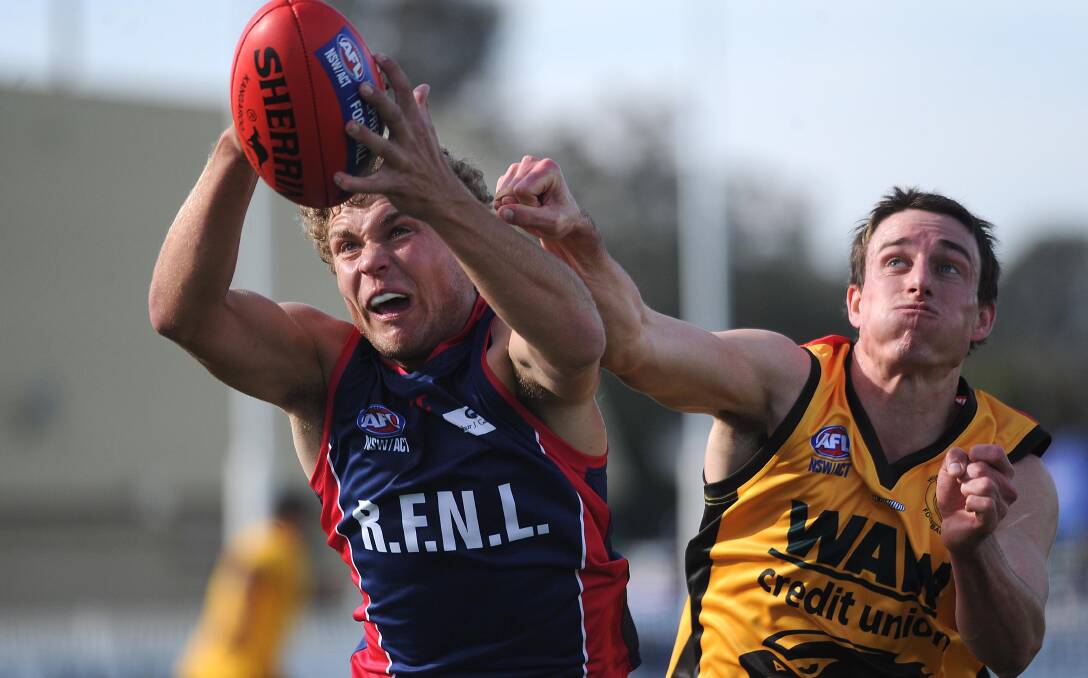 LEAGUE'S BEST: Jayden Klemke, left, representing the Riverina League in May. The Demons midfielder was the coaches' pick for player of the year.