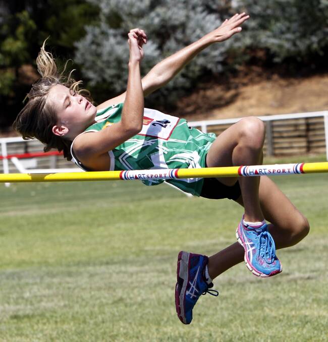 TAKEOFF: Finley's Jasmine Burke, 10, in Saturday's high jump. Picture: Les Smith