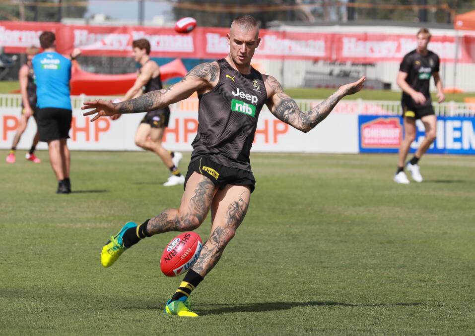 The men's teams have a run on Robertson Oval ahead of Sunday's game. Pictures: Les Smith