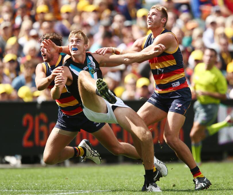 GREAT START: Dougal Howard kicks a goal on debut for Port Adelaide against the Crows. Picture: Getty Images