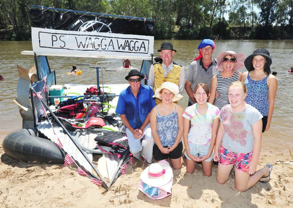 The PS Wagga Wagga and her crew (back) Peter Sheppard, Steve Burgess, Maurice Boldiston, Monika Burgess, Jacinta Burgess, 15, (front) Natalia Burgess, 12, Grace Lyell, 13, and Danielle Manns, 13, at the 2015 Wagga Gumi Race held on February 15. Picture: Kieren L Tilly