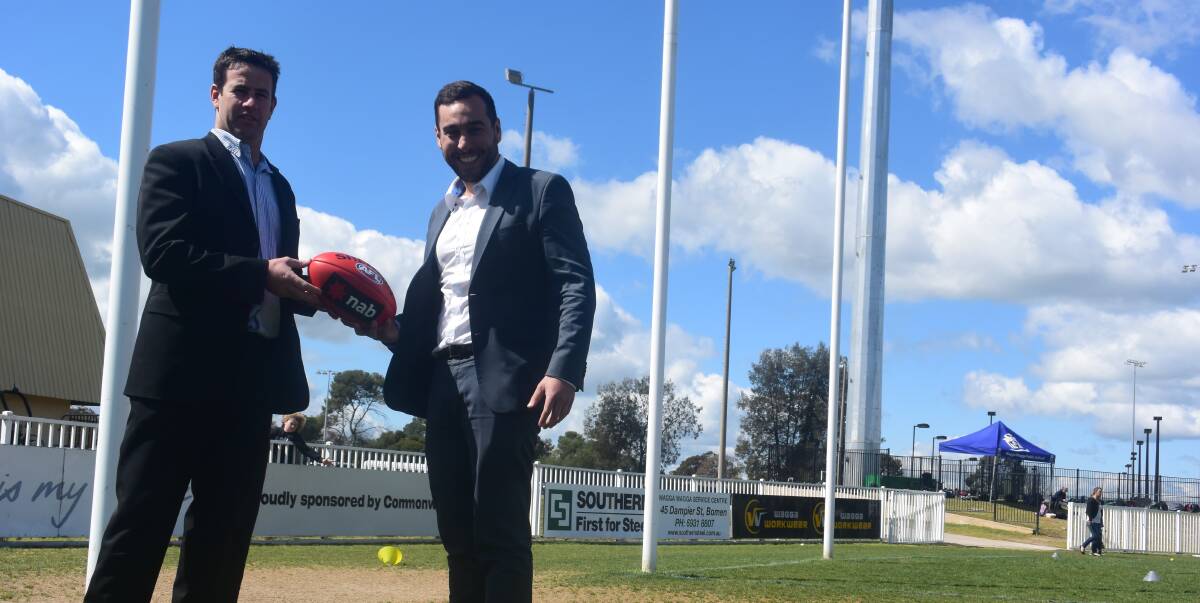 GAME ON: Southern NSW AFL regional manager Jason McPherson and AFL NSW's Joseph La Posta celebrate a new relationship with Wagga City Council, which will develop community programs and deliver games to the region. 