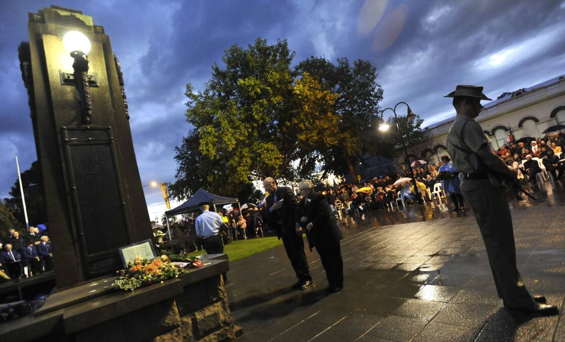 More than 2000 people withstood the rain to attend the dawn service at the Wagga Cenotaph in the Victory Memorial Gardens.