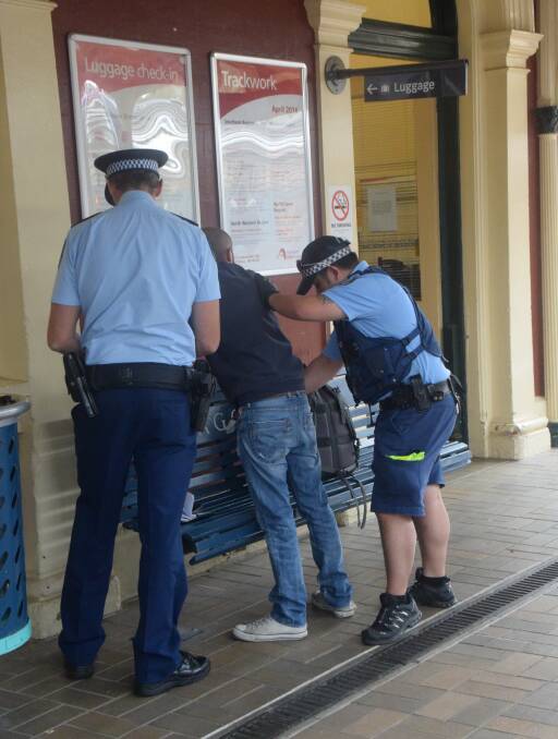 SEARCHED: Police from Wagga Local Area Command and Police Transport Command search passengers for drugs at Wagga railway station on Friday.