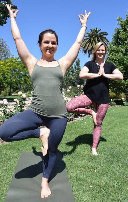 TAKING TIME: Instructor Megan Crossfield and organiser Bronwyn Brown prepare for the city's first 30-day yoga challenge as they call for people to try their hand.