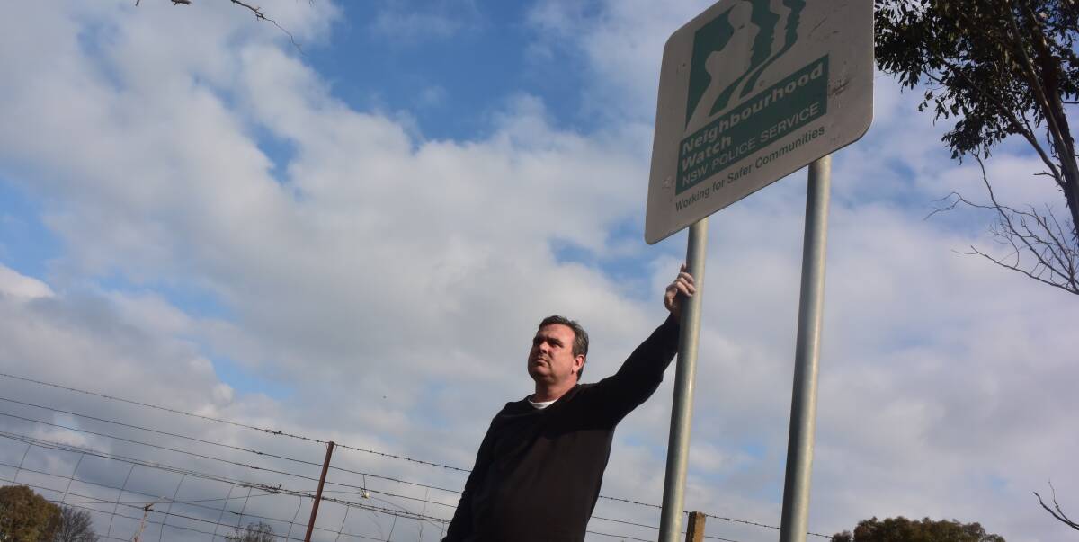 FORGING AHEAD: Wagga Neighbourhood Watch committee president David Abbott hopes 150 more signs erected around the city will deter crime by encouraging neighbours to look out for one another. Picture: Ella Smith