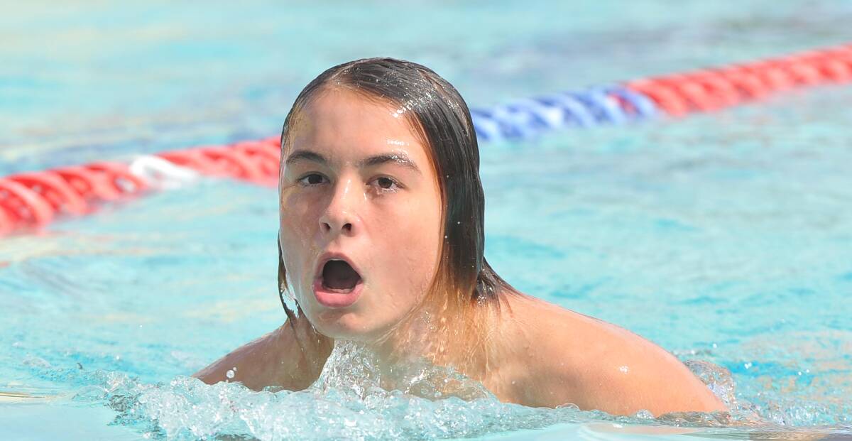 MID SWIM: Jack Flood takes a breath during a Wagga High School swimming carnival race. Picture: Laura Hardwick