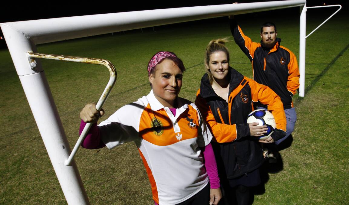 MAKING A STAND: Wagga United player Holly Conroy, captain Jes Smith and Holly's reserve grade coach Keith Ramsay training at Duke of Kent Oval this week. Picture: Les Smith
