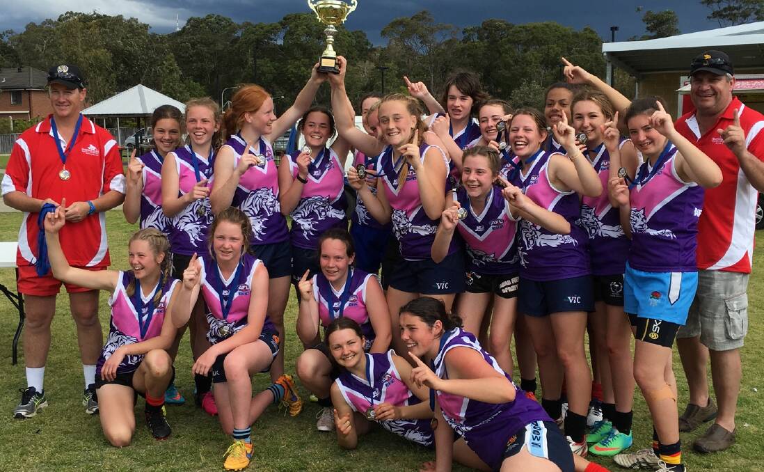 CUBS CELEBRATE: Without training, or playing together, with little sleep in the lead-up, and with just a small handful of experienced players, Riverina Cubs won a state tournament in Bateau Bay on Sunday. 