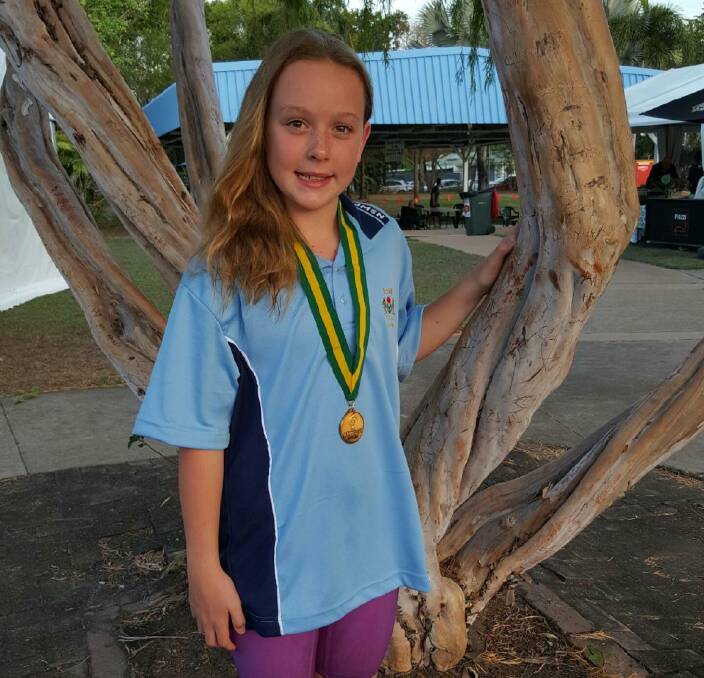 GOLDEN GIRL: Hard work pays off for Wagga's Abbey Senior, 10, who claimed gold in the medley relay at the National Championships in Darwin on Friday. Her team is also tipped to win the 4x50m relay later on in the week.