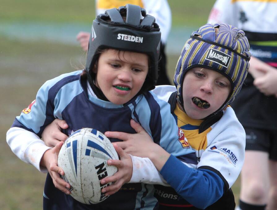 Oceana Dodd and Logan Foster as Wodonga Storm play Wagga Magpies in the under 8 rugby league at Parramore Park. Picture: Les Smith