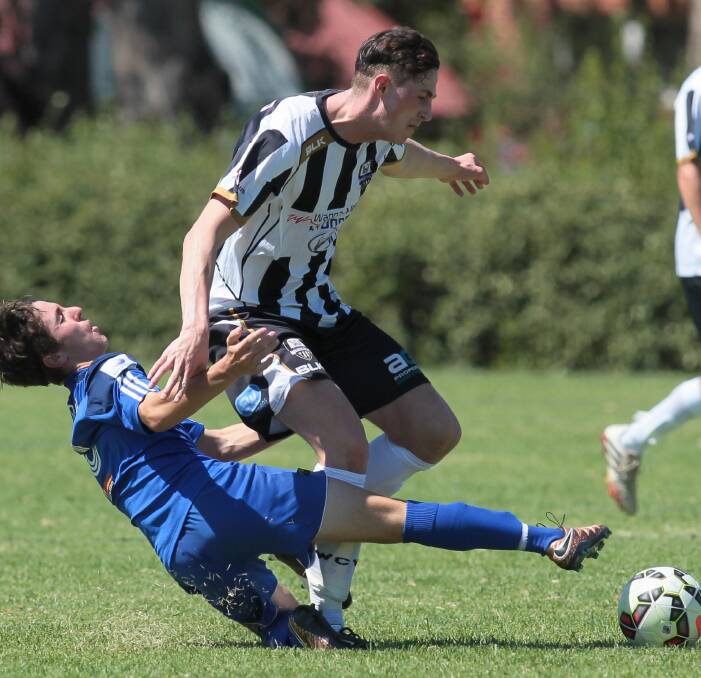 COMPOSED: Wanderers new inclusion from Scotland, Antonio Vastano, keeping his cool under pressure from Albury City's Caleb Styles in the trial match at Gissing Oval on Sunday. Picture: Les Smith