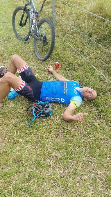 SPENT: Daniel Bereford has a breather after a challenging stage two of the Crocodile Trophy on Sunday.