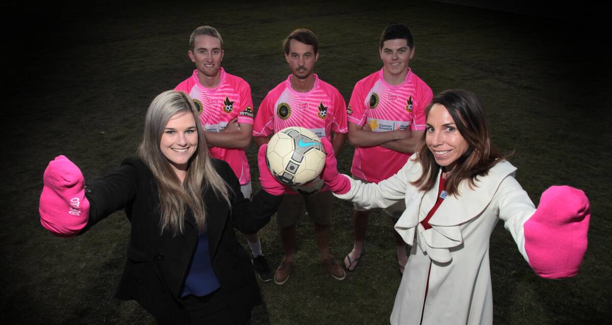 IN PINK: Wagga United players Jes Smith and Felicity Kerslake with Daniel Lawrence, Damon Hardinge and Geordan Ellicott prepare for the fundraiser on Sunday. Picture: Les Smith