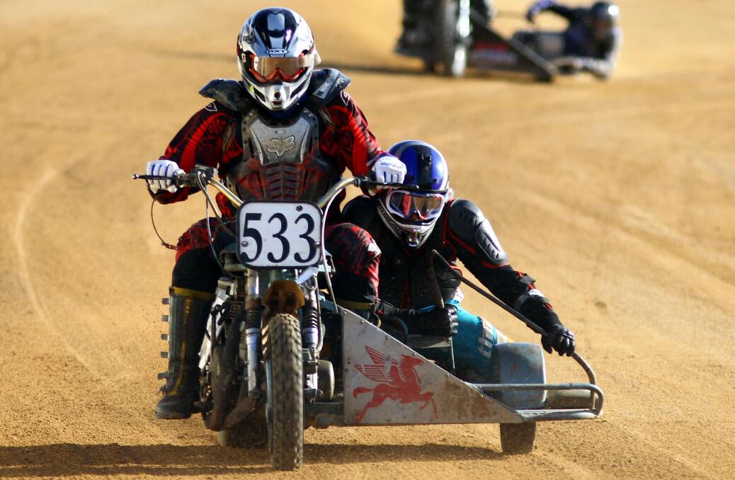 HOMEWARD STRETCH: Rod Watts and Pat Balk from the Southern Highlands in the classic sidecars race at the Wagga Speedway on Saturday. Picture: Les Smith