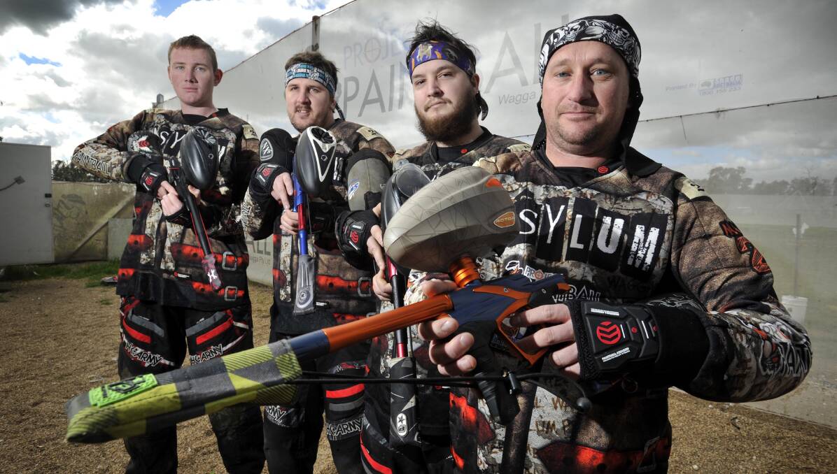 GOING GREAT GUNS: Wagga paintball team members (from left) Conor Reid, Michael Warner, Todd Young and Michael Naumoski. Picture: Les Smith
