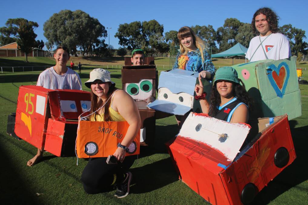 ALL OUT: Year 12 students Robert Allen, Laura Pocius, Ben Murray, Joss Heap, Lili Blackett and Charlie O'Mahoney dress up for their final athletics carnival on Thursday.