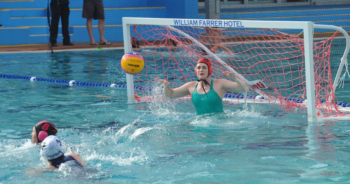 Octopuses goalkeeper Alice White making a save in Round 12 of the women's A-grade water polo. Picture: Rebecca Fist