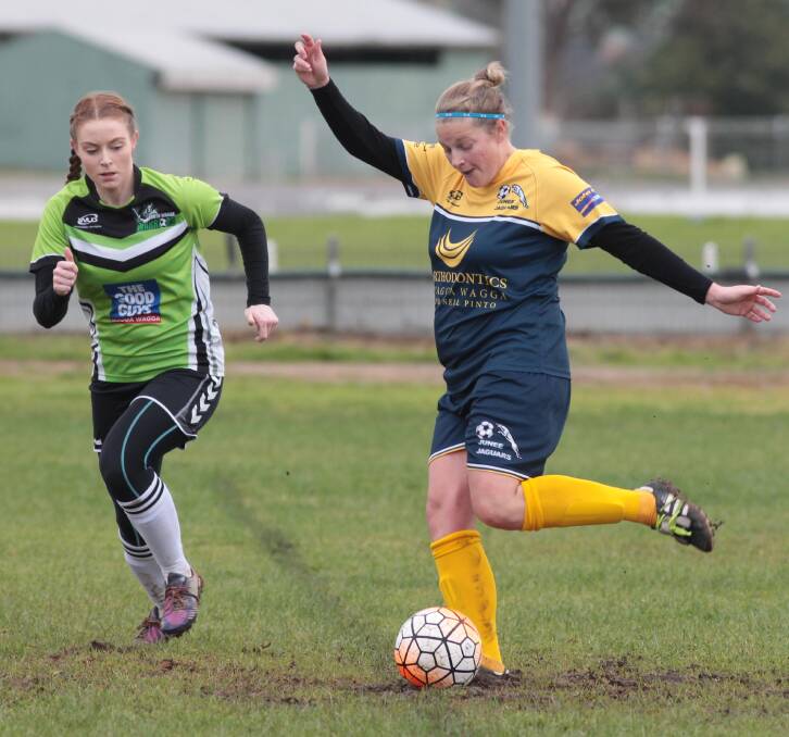 SHOT: South Wagga's Holly Hodges and Junee's Elisha Ward (right) on the 18 yard box at the Showgrounds on Sunday. Picture: Les Smith