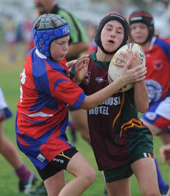 HIT UP: Charlie Cronk and Jack Kennett as the Kangaroos play against Harden/Boorowa in under 13's rugby league in Wagga on Saturday. Picture: Laura Hardwick