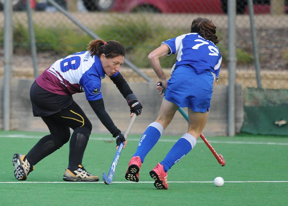 CHALLENGER: LAC United's Tanya Sheppard (left) and Royals' Clara Dobbie in the Royals' 9-1 win on Saturday. Picture: Laura Hardwick  