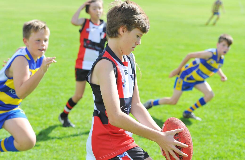 North Wagga's Lachlan Oakman ready to kick it in the under 11's match at McPherson Oval on Sunday. Picture: Kieren L. Tilly