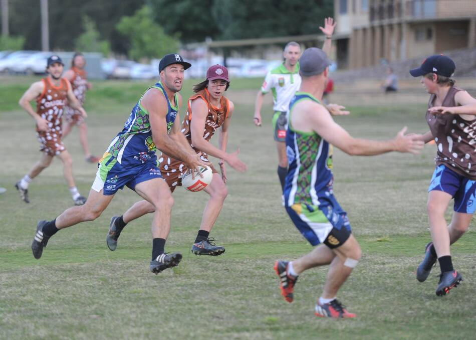 MIDDLE: Cobras' Ben Absolum fakes left and surges to the right, causing mayhem for the Quolls at Jubilee Park on Tuesday. Picture: Rebecca Fist